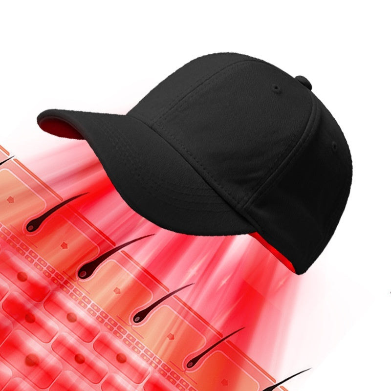 Black cap on a white background with red and pink abstract design