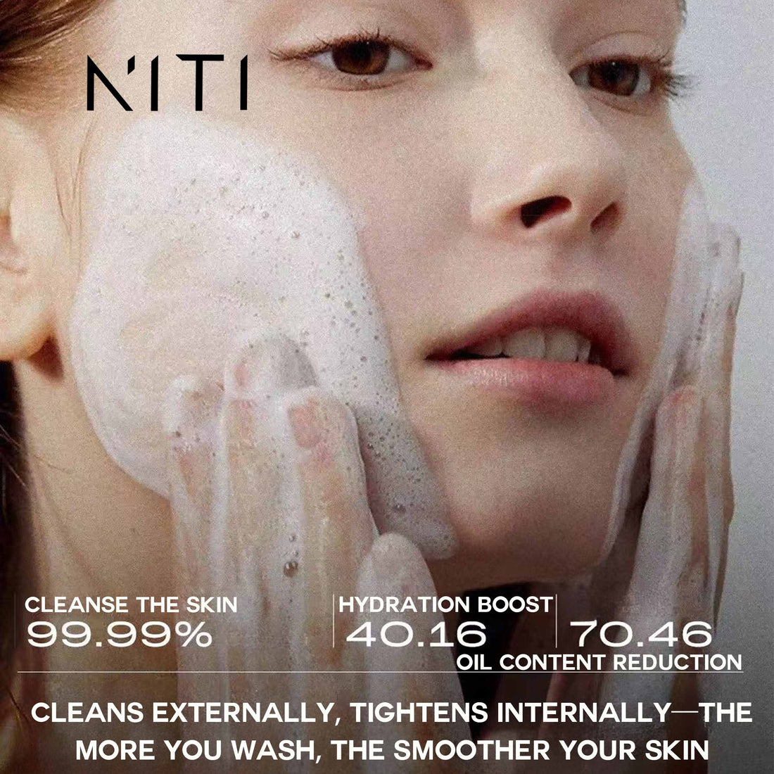 Close-up of a woman washing her face with thick white foam, with the NITI brand name at the top and product benefit text along the bottom.