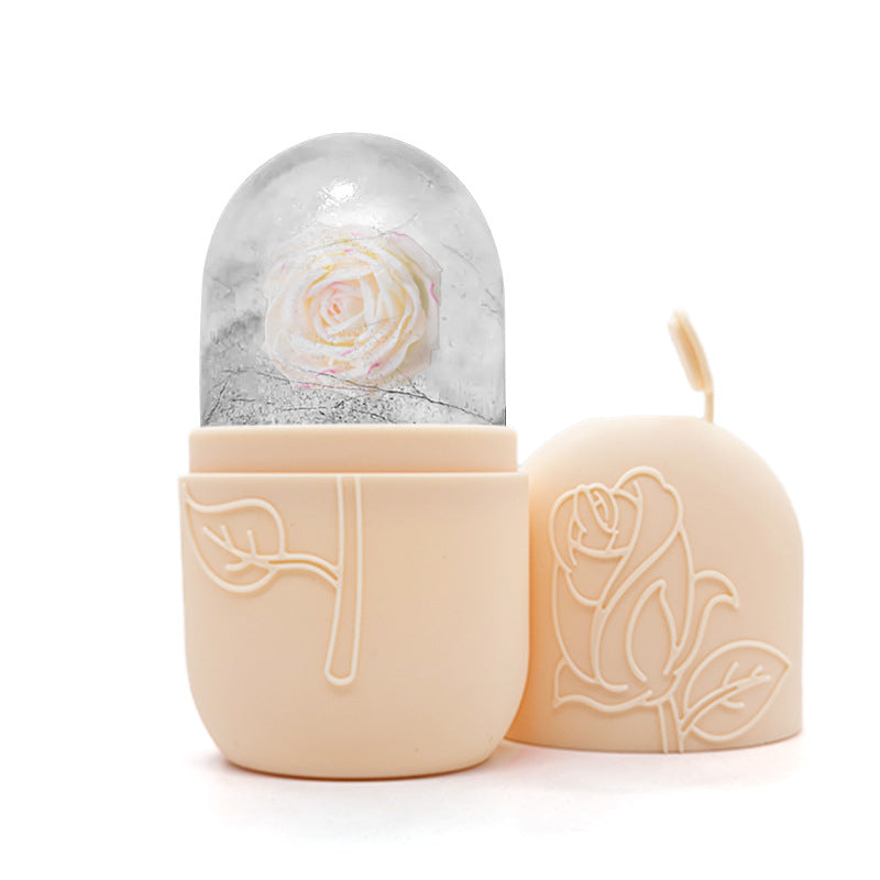 Decorative candle with a rose design on a white background