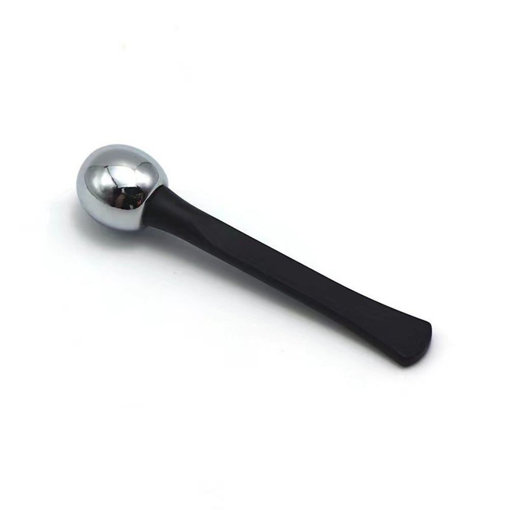 Metallic ball with a black handle on a white background