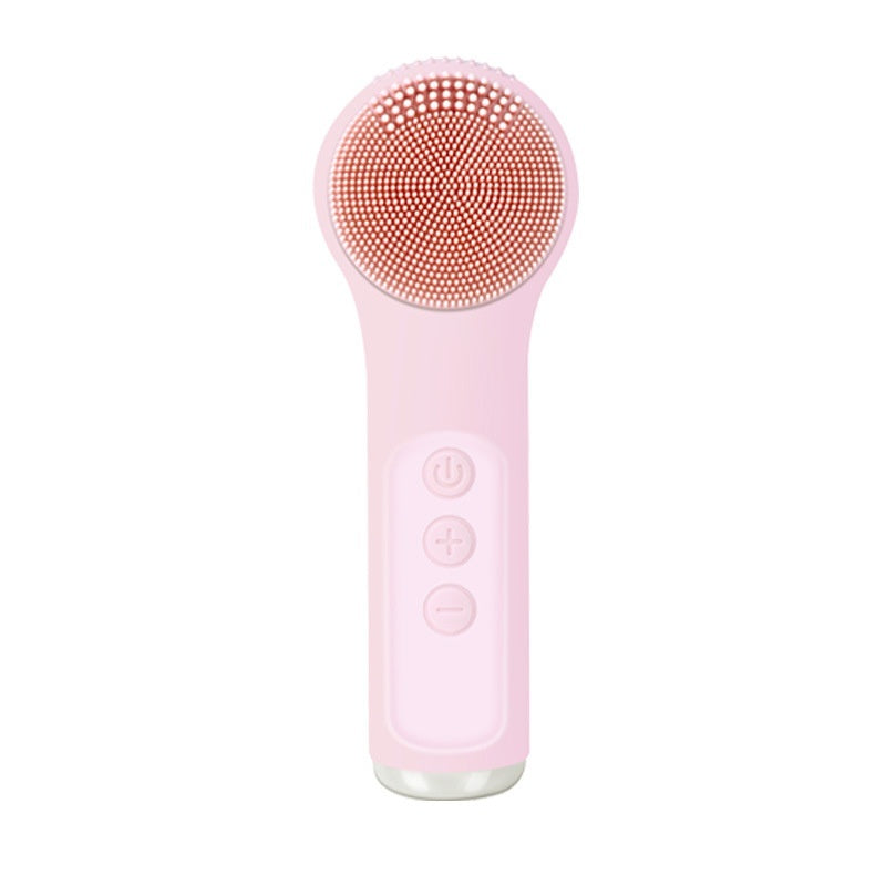 Pink electronic device with a circular head on a white background