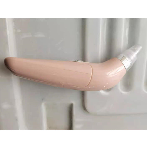 Pink handheld device on a textured white background