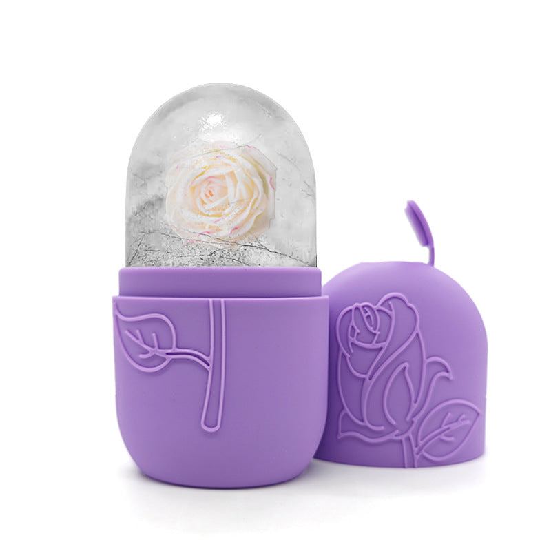 Purple container with a rose design holding a white rose inside on a white background