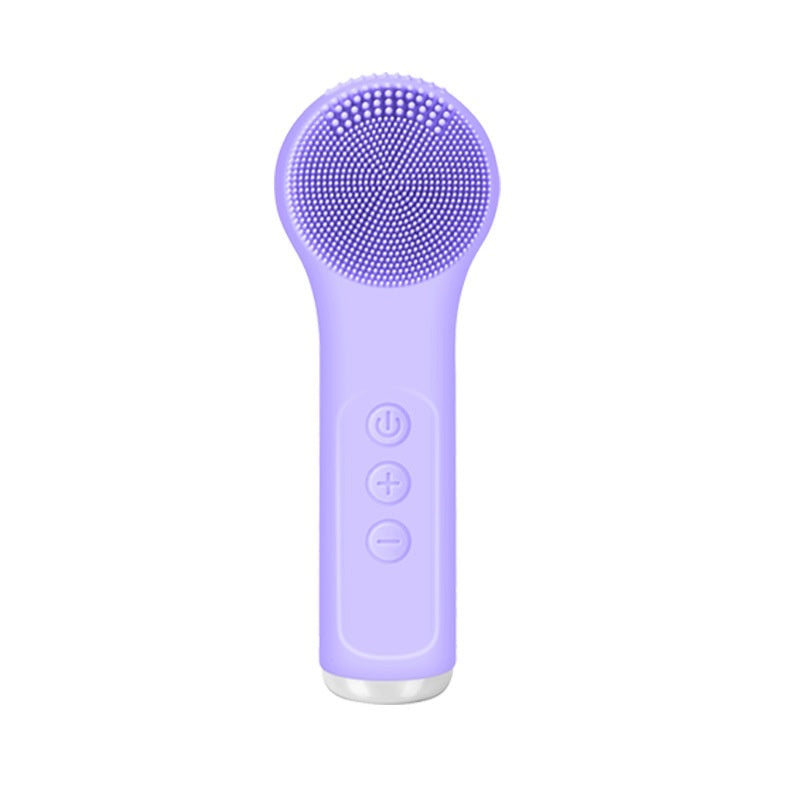 Purple handheld device with a brush head on a white background