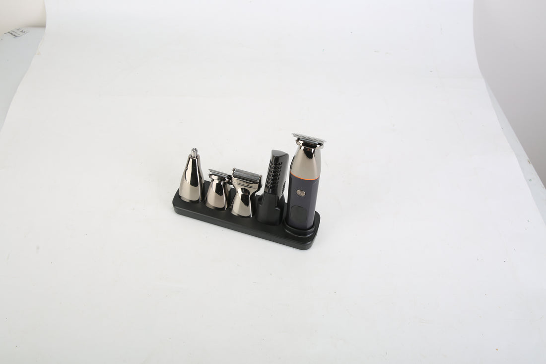 Set of metal tools on a black stand against a white background