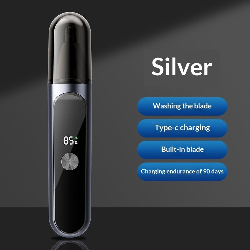 Silver electronic device with digital display on a dark background