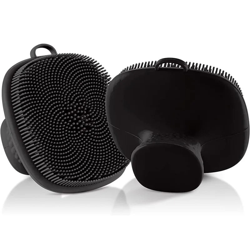 Two black silicone scrubbers on a white background