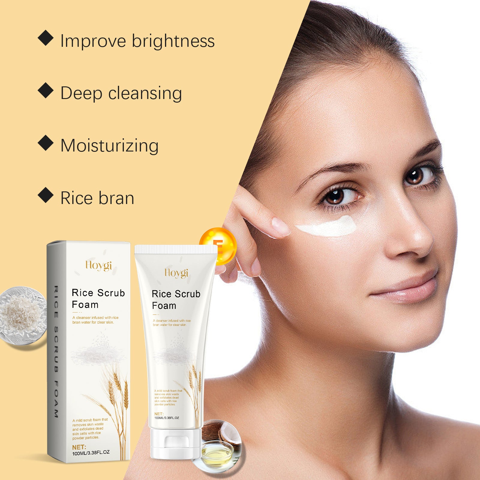 Woman applying rice scrub foam to her face with product packaging on a beige background