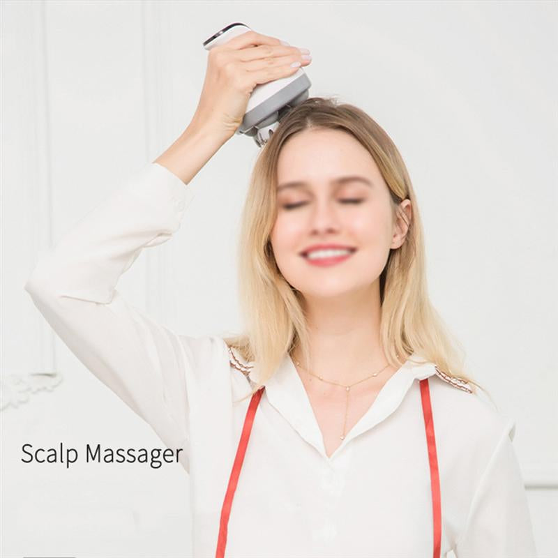 Woman using a scalp massager with a plain background