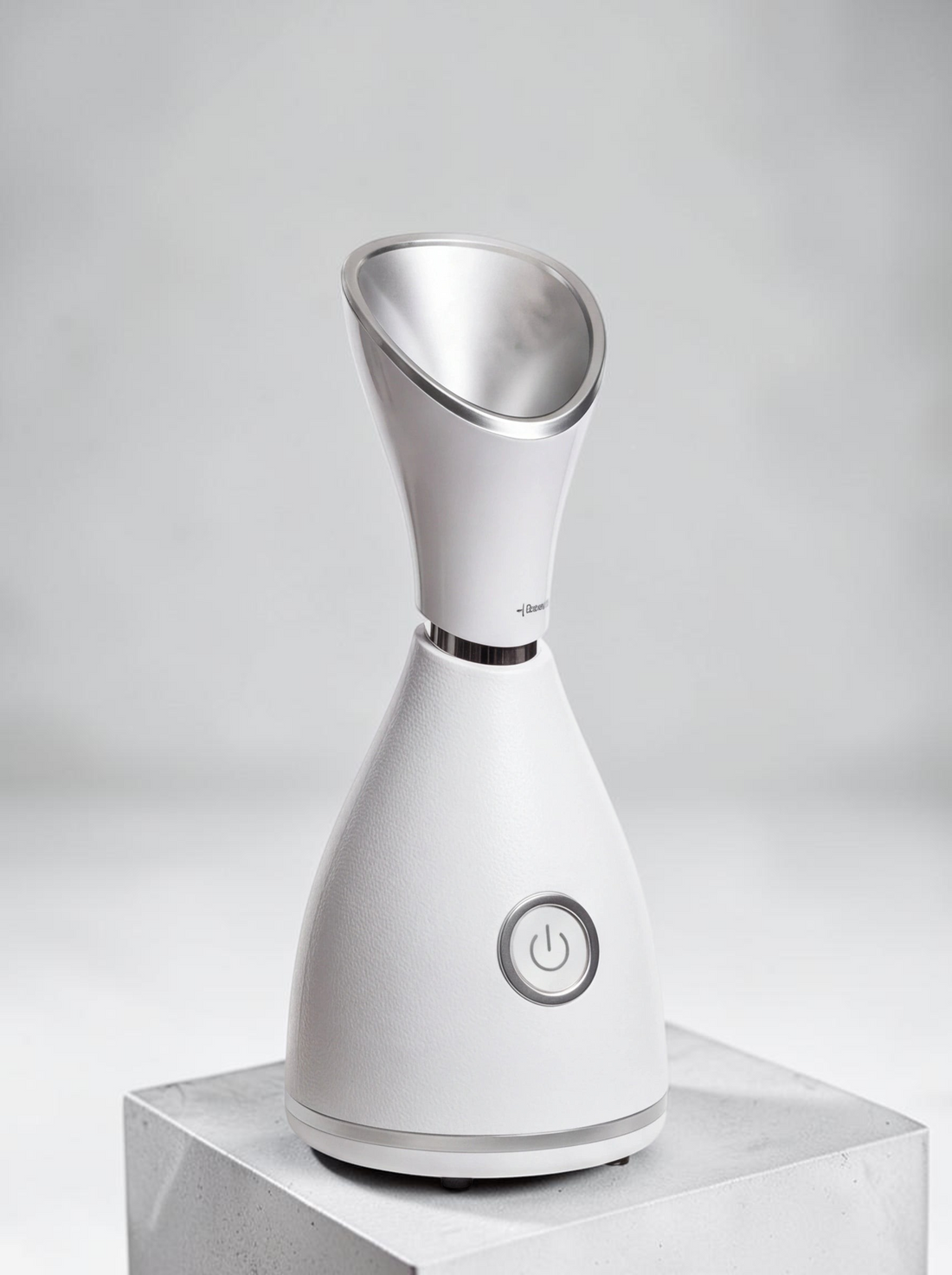 TheGromify nano ionic facial steamer in white with a silver nozzle for deep pore cleansing and skincare absorption.