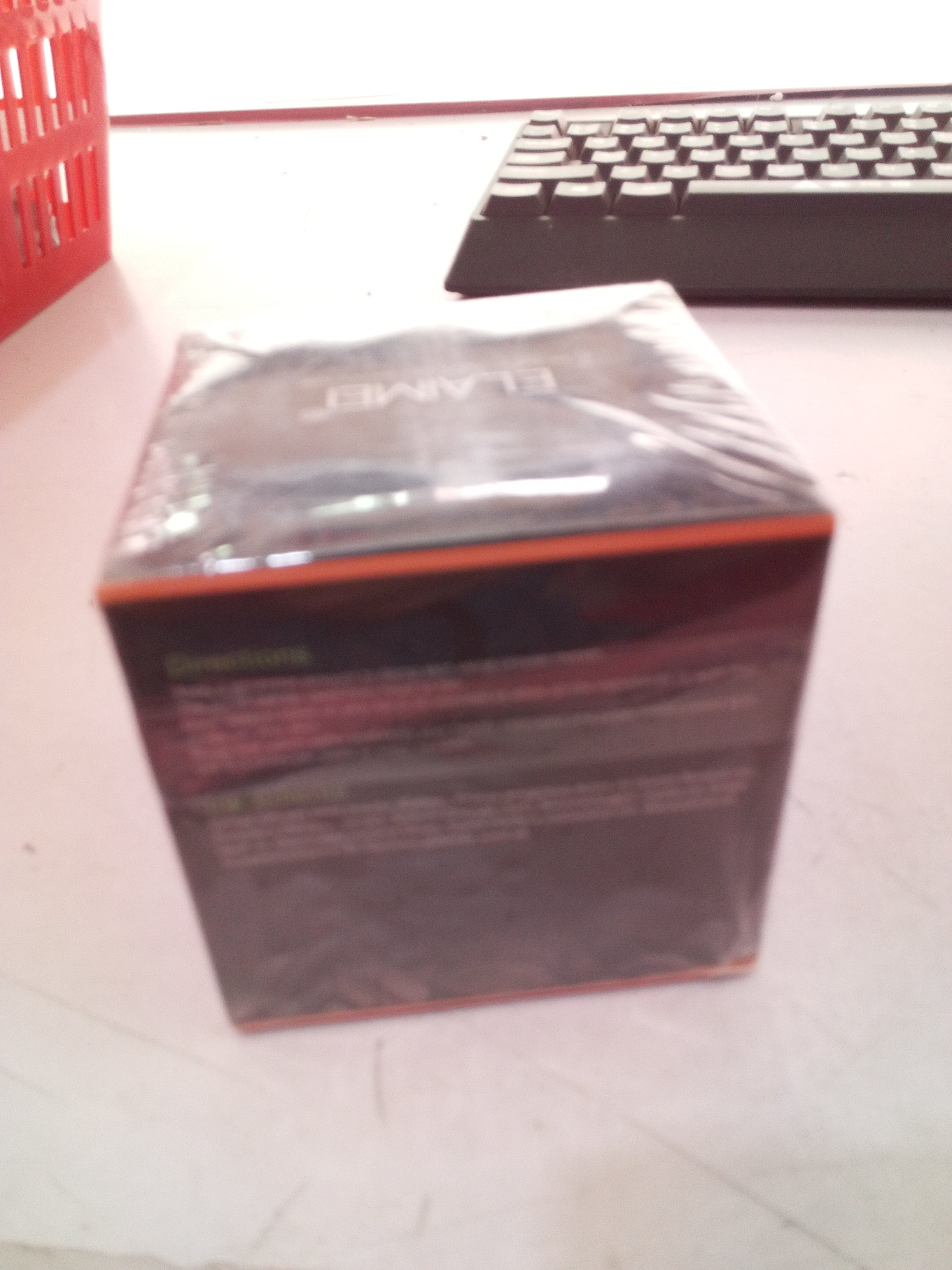 Exfoliating body-care scrub displayed in its product container