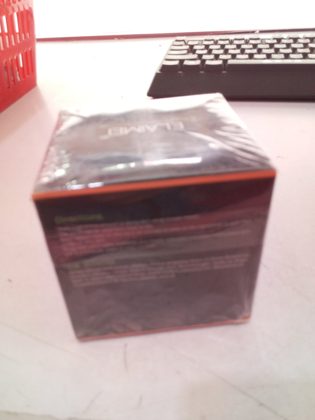 Exfoliating body-care scrub displayed in its product container