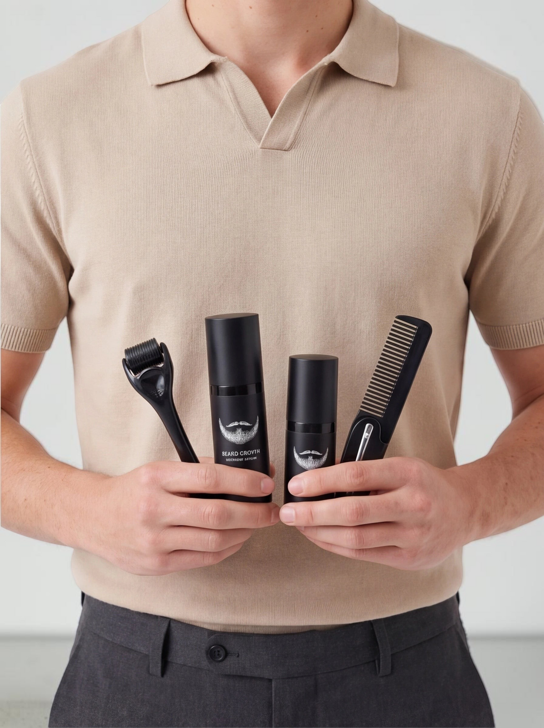 TheGromify beard growth kit featuring a microneedle roller, disinfectant spray, serum, and comb held by a man.