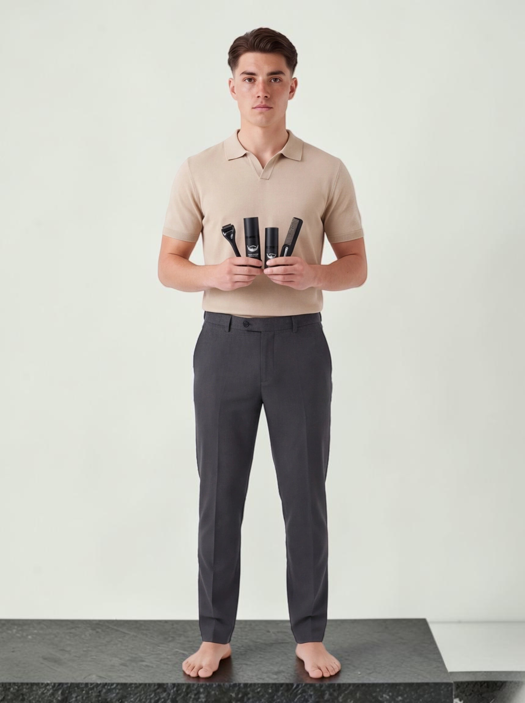 TheGromify beard growth roller kit held by a man in a beige polo shirt, featuring microneedle roller and disinfectant.