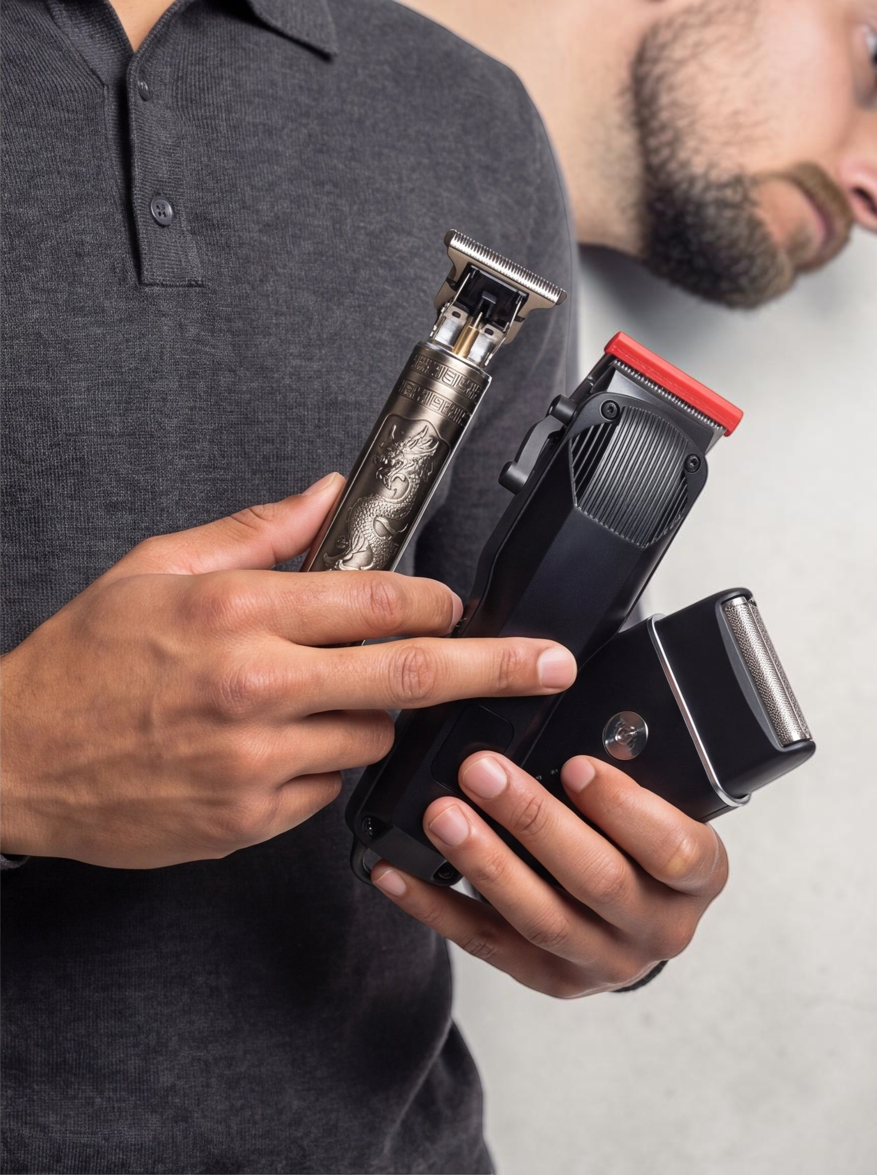 TheGromify cordless hair clipper kit featuring a dragon-engraved trimmer, black clipper, and foil shaver in hand.