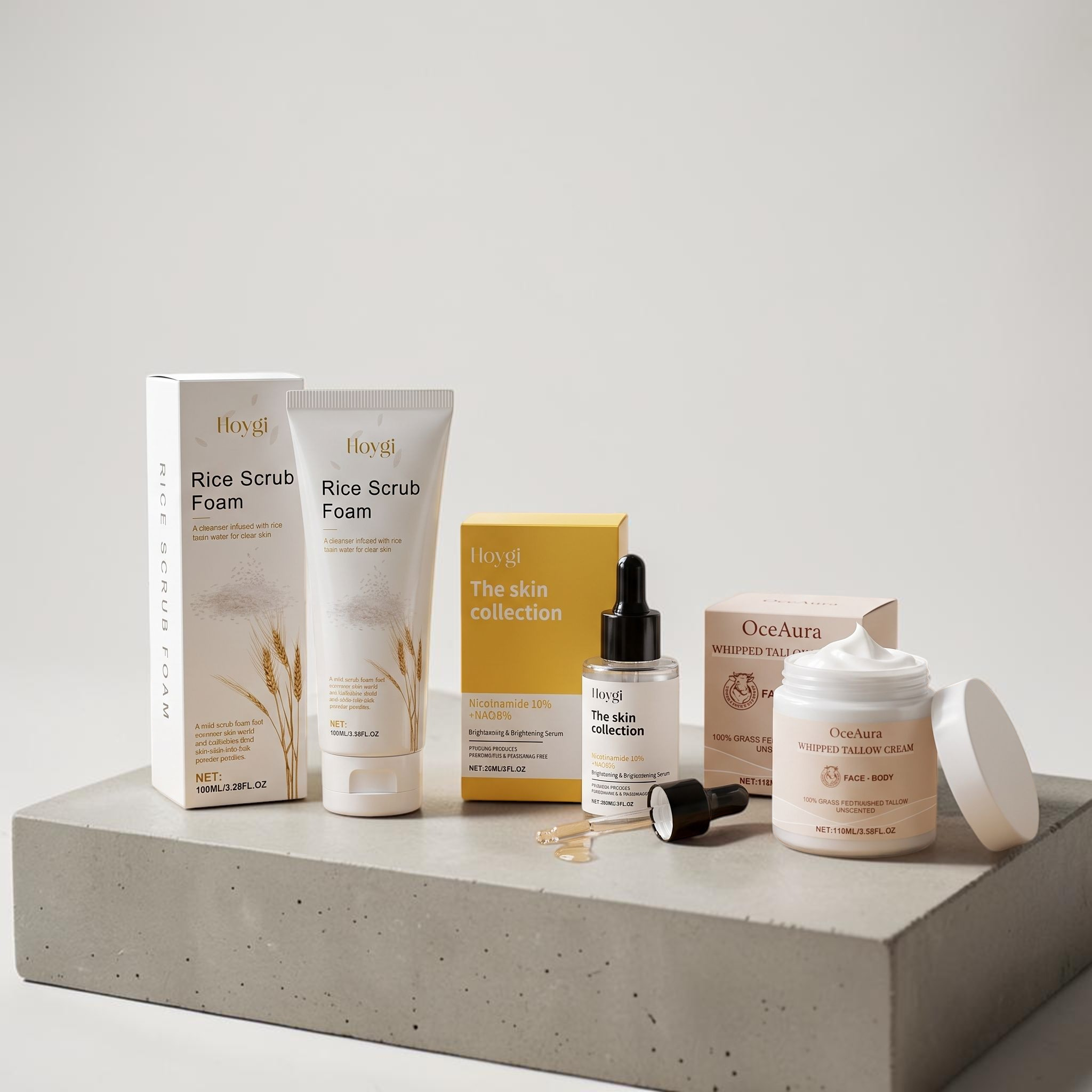 TheGromify 3-step skincare kit featuring rice scrub foam, brightening serum, and whipped tallow cream on a stone base.