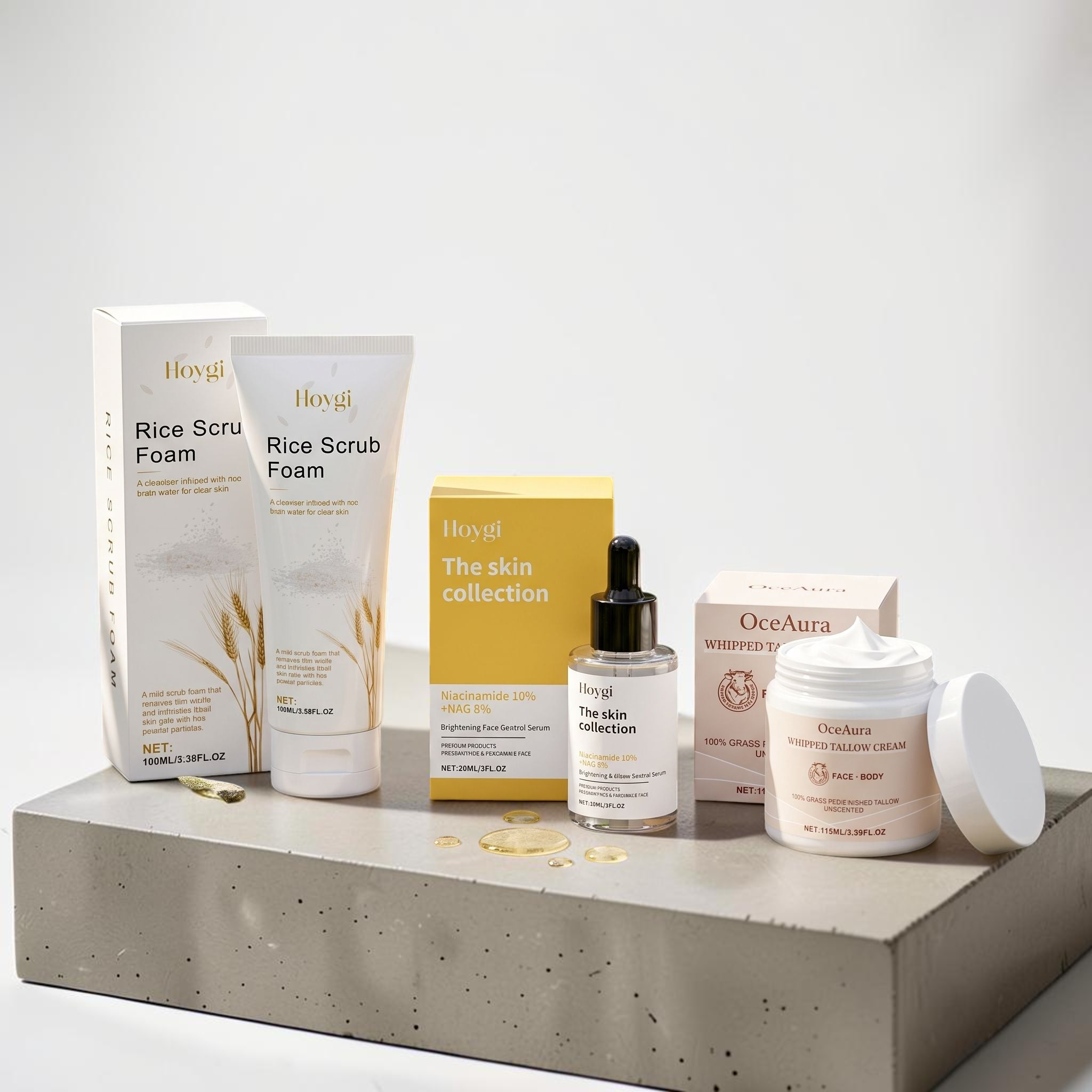 TheGromify 3-step skincare kit featuring rice scrub foam, niacinamide serum, and whipped tallow cream on a stone base.