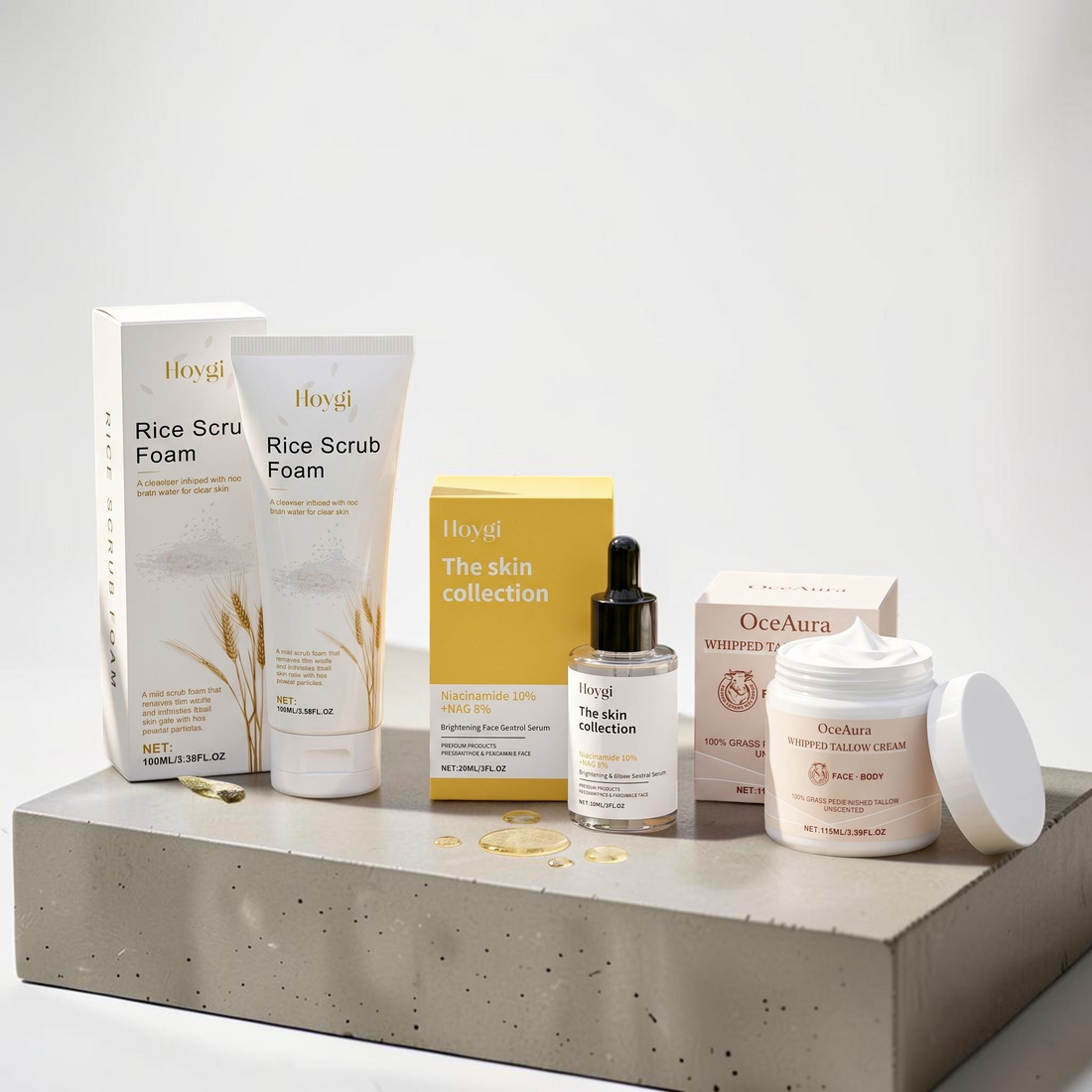 TheGromify 3-step skincare kit featuring rice scrub foam, niacinamide serum, and whipped tallow cream on a stone base.