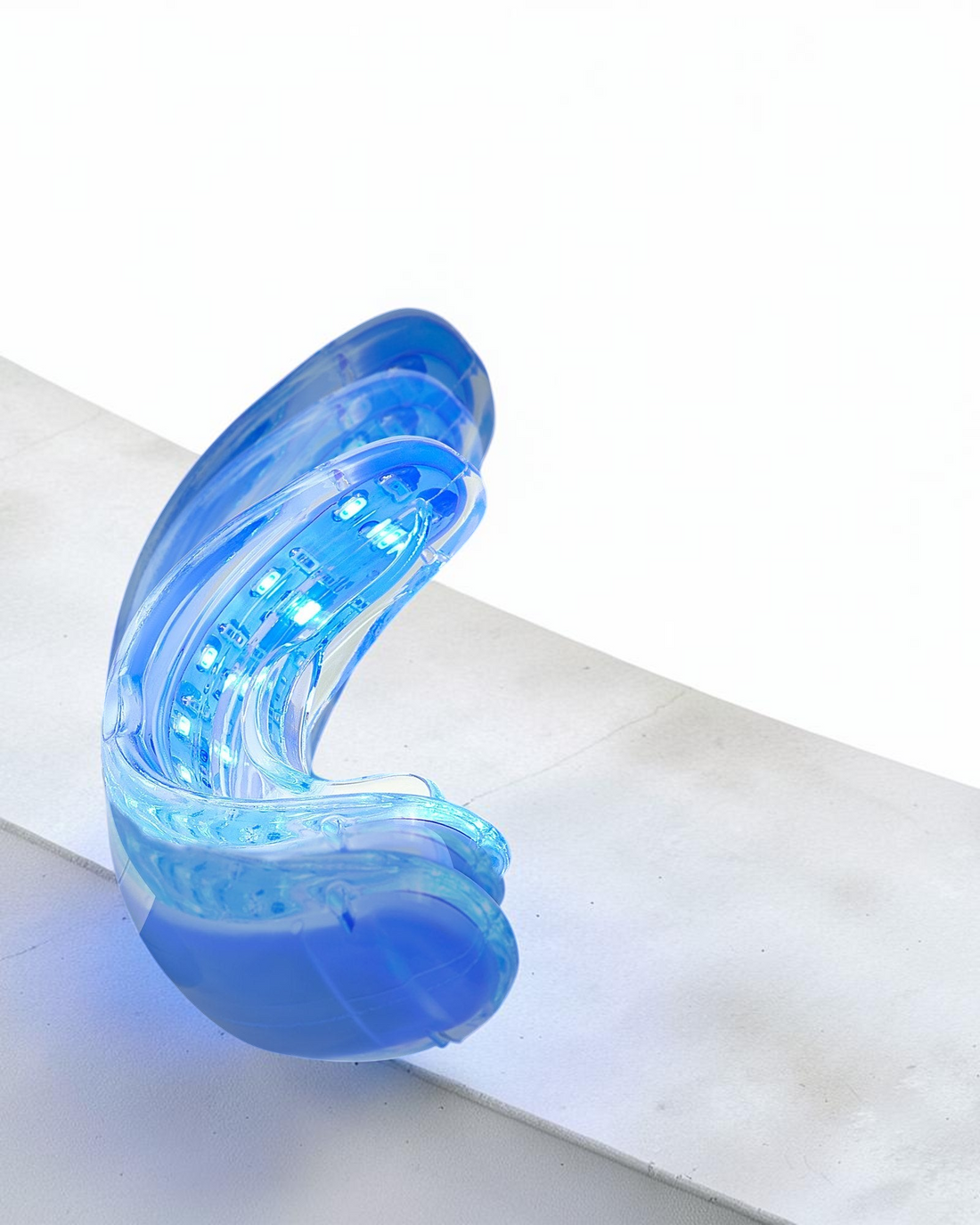 TheGromify 32-LED teeth whitening tray with blue light technology for gentle at-home dental brightening.