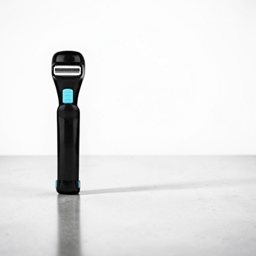 TheGromify back hair shaver with a sleek black handle and blue accents, designed for easy body grooming.