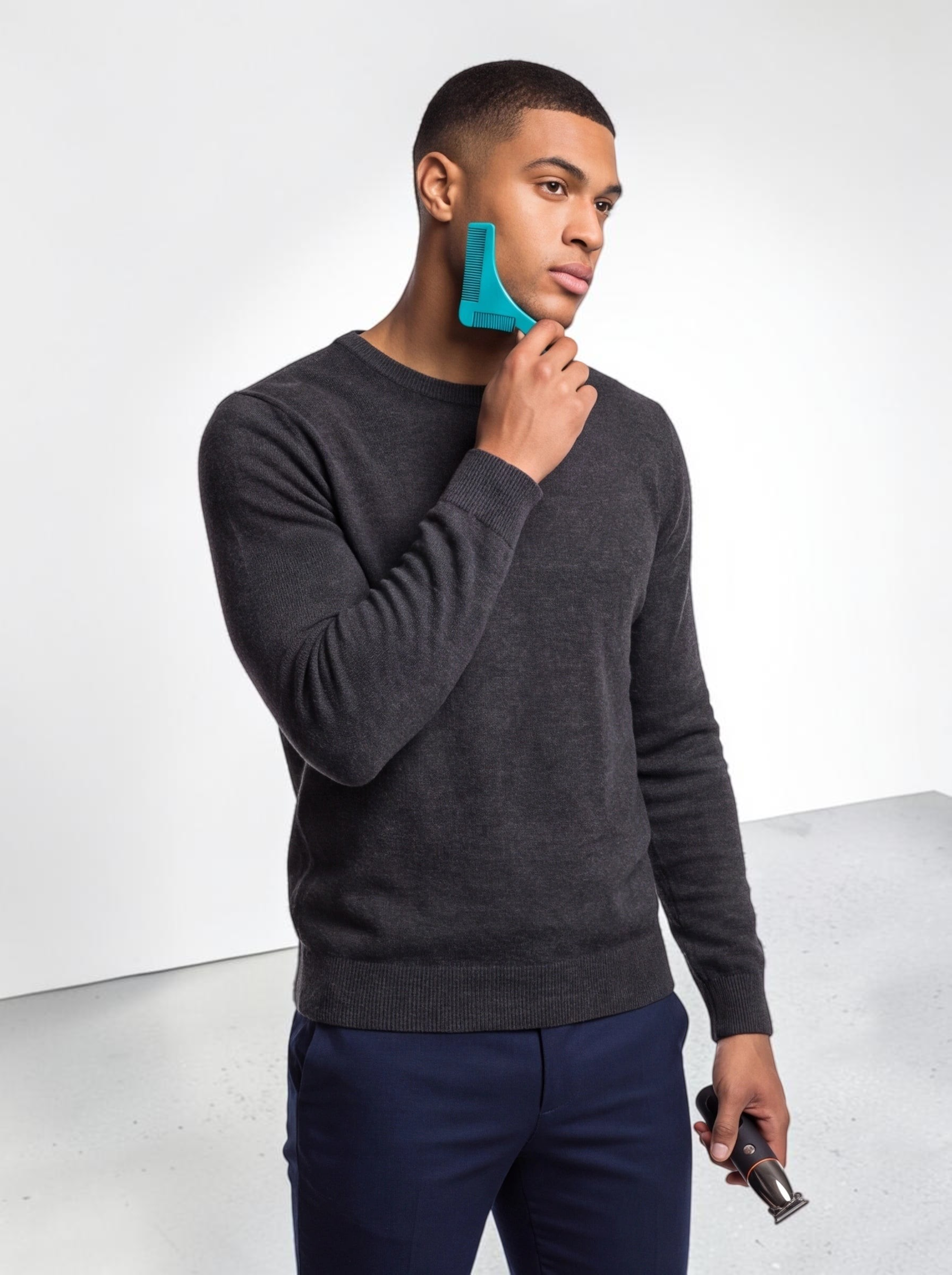 TheGromify model using a teal beard lining tool and holding a waterproof trimmer for precision grooming