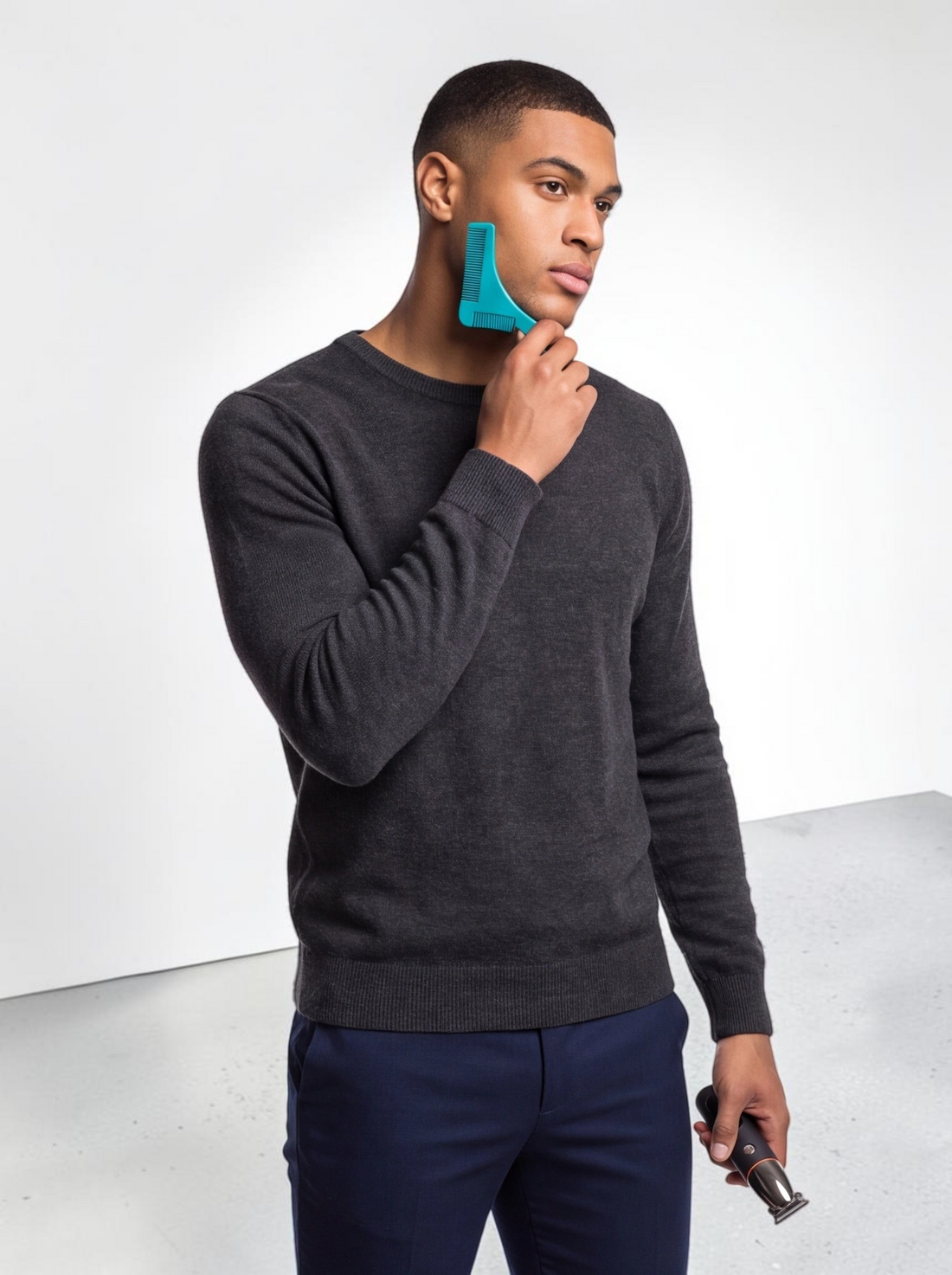 TheGromify model using a teal beard lining tool and holding a waterproof trimmer for precision grooming