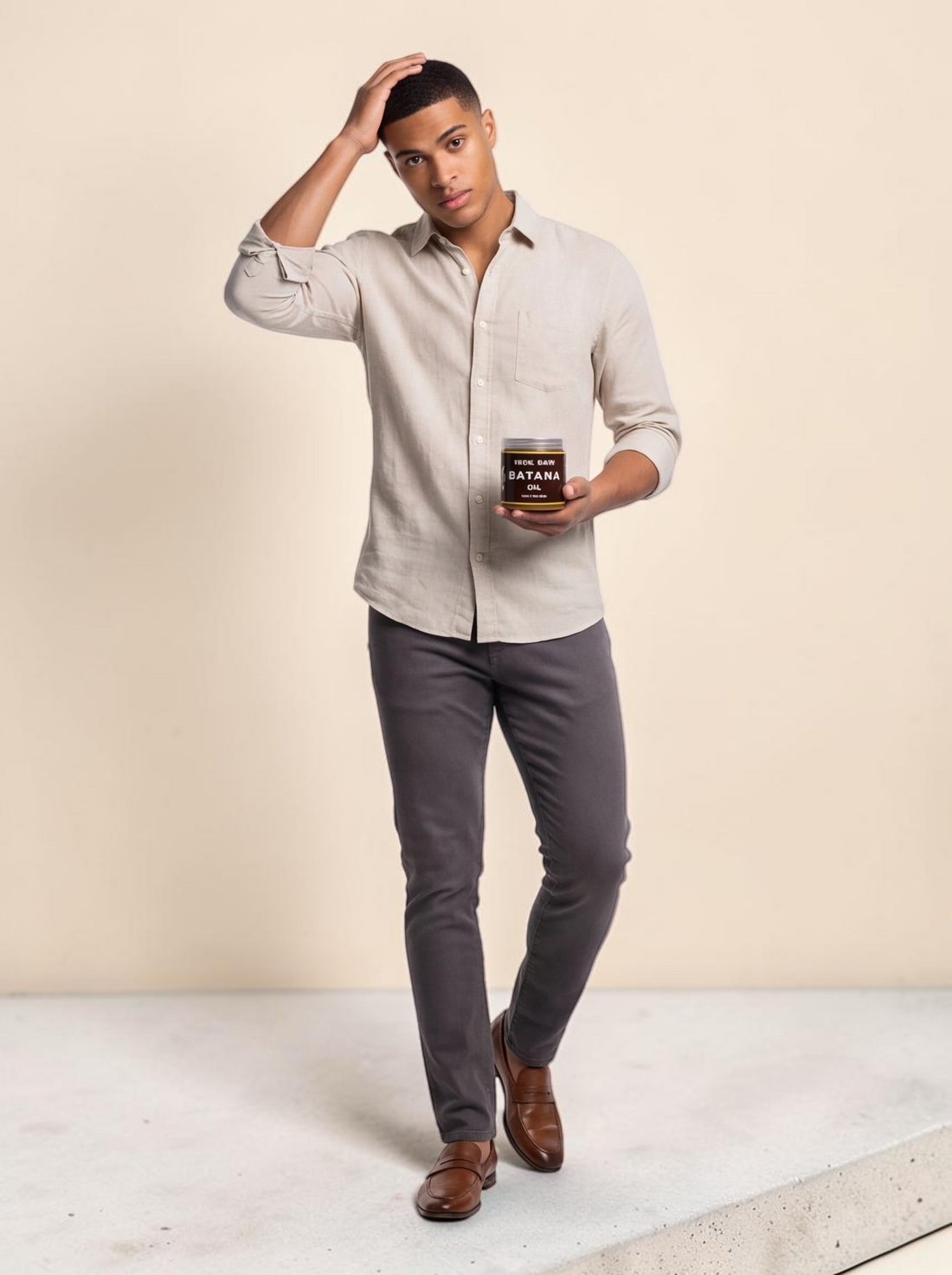 A man holding a jar of TheGromify Deep Repair Hair Mask, showcasing hair care for dry and damaged hair.