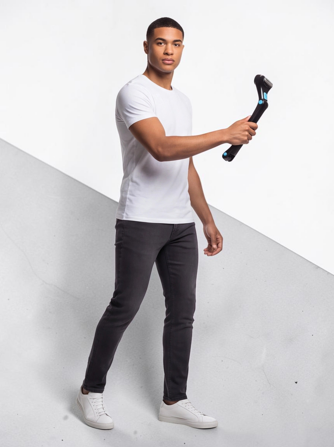A man holding a TheGromify long-handle back hair shaver with a foldable ergonomic design for solo grooming.