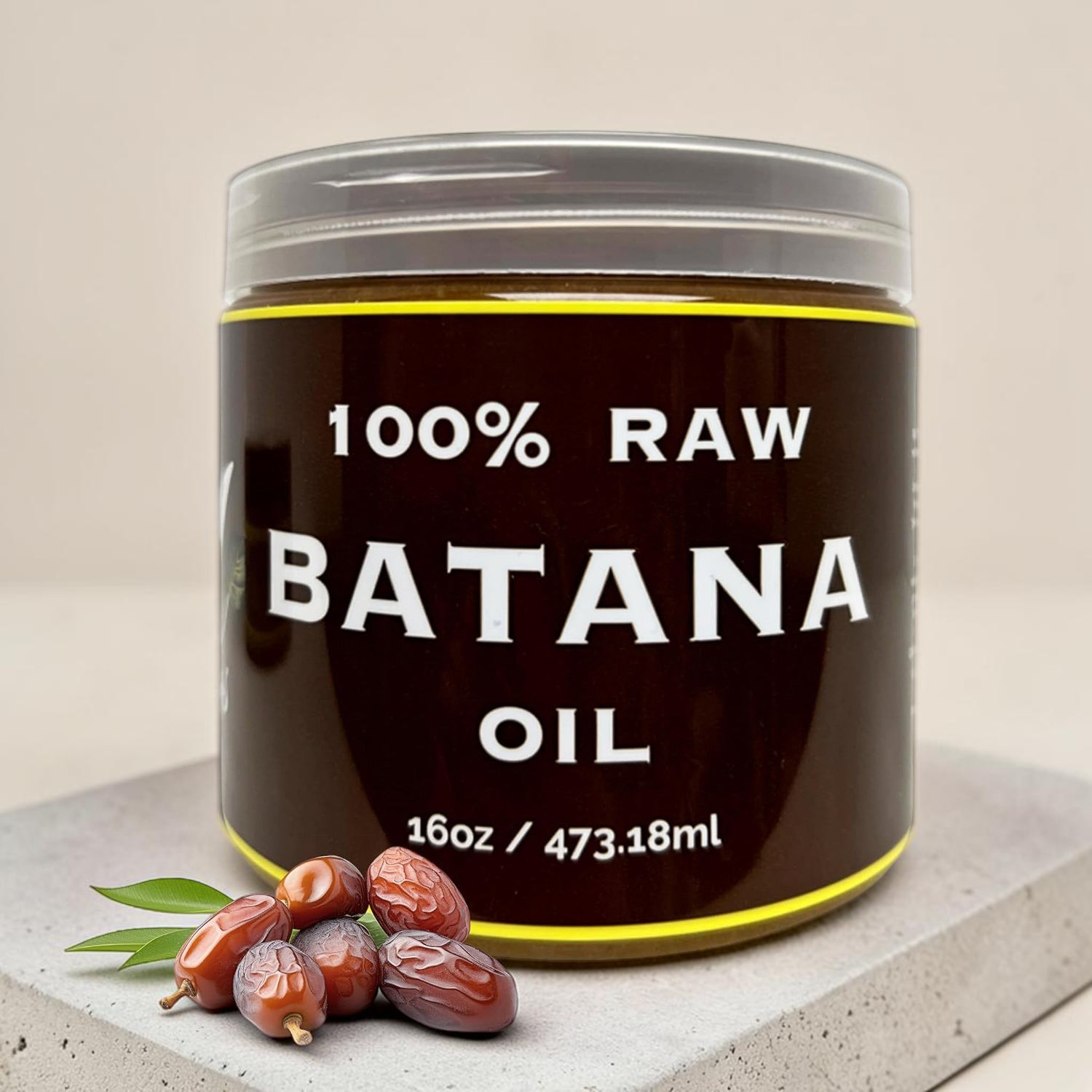 TheGromify 100% raw batana oil hair mask in a brown jar with fresh nuts on a stone base for deep hair repair.