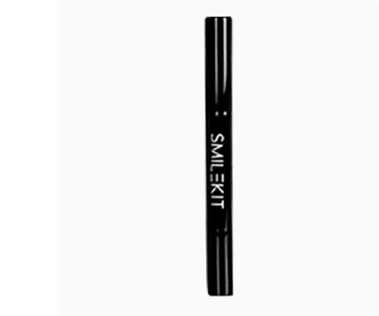 TheGromify wireless teeth whitening pen in black with white SMILEKIT branding for at-home dental care
