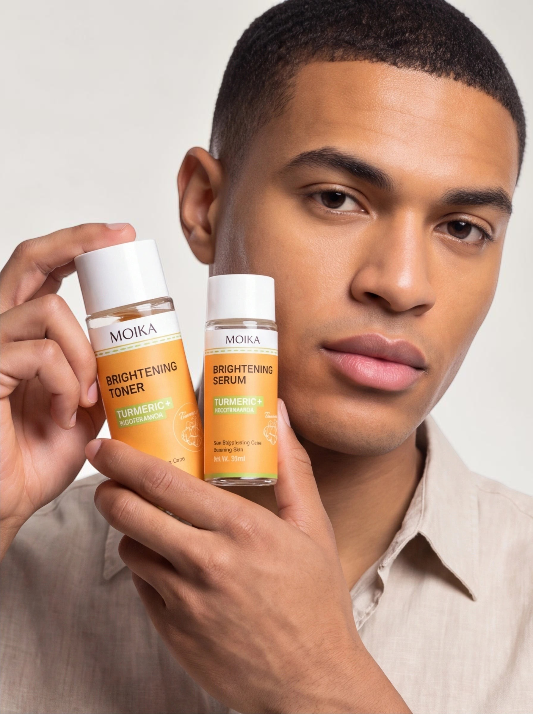 A man holding TheGromify Turmeric and Nicotinamide brightening toner and serum bottles for a skincare routine.