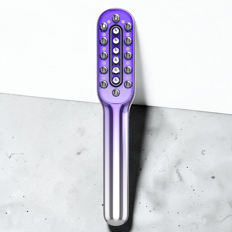 TheGromify vibrating red light hair growth comb with serum delivery system for scalp stimulation and hair regrowth.