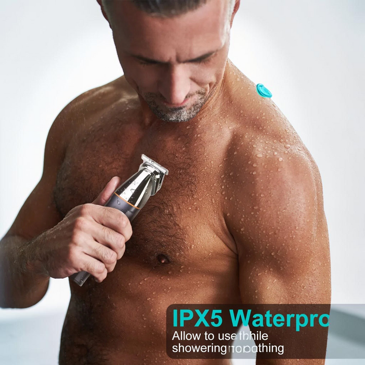 TheGromify 5-in-1 waterproof grooming trimmer being used by a man in the shower for body hair maintenance