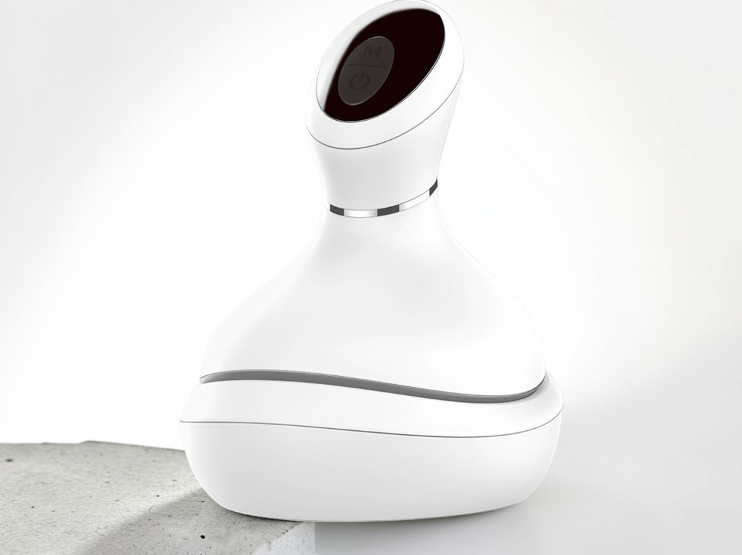 TheGromify wireless electric scalp massager in white with 3D kneading nodes for stress relief and hair health.