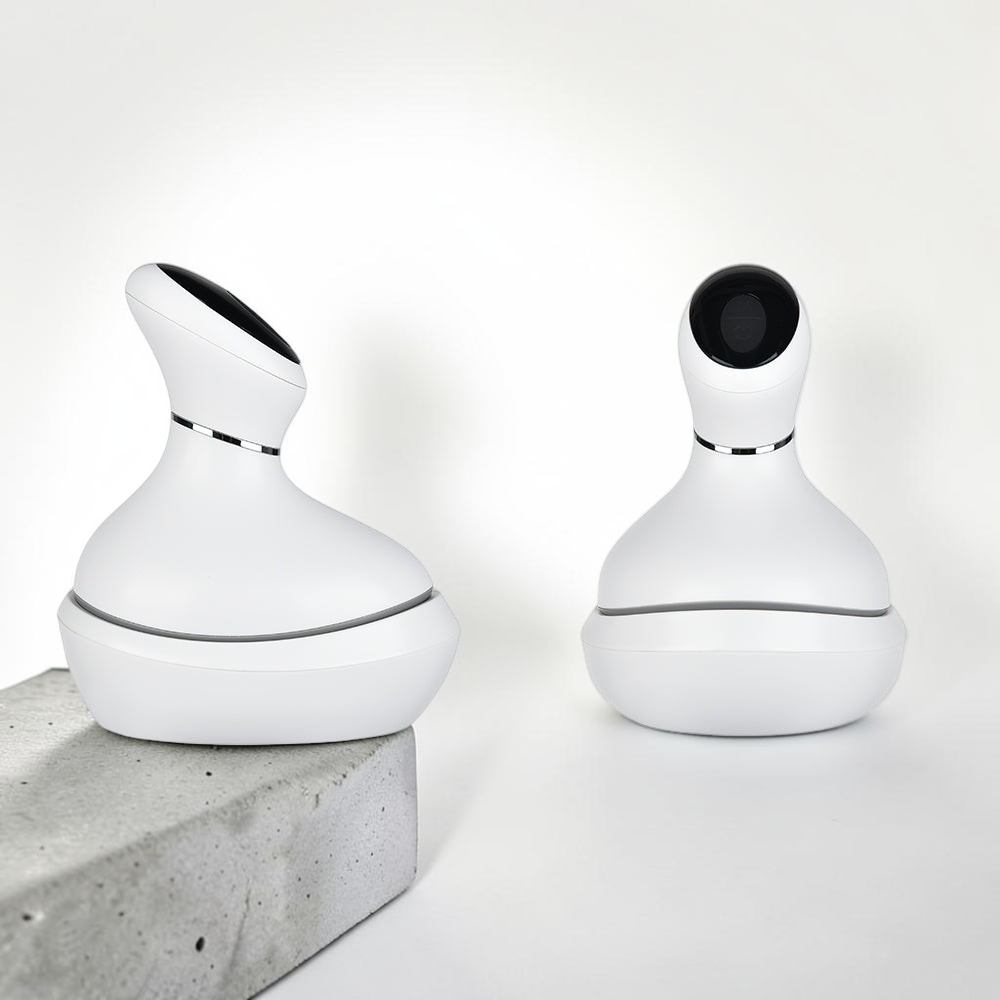 TheGromify wireless electric scalp massager with white ergonomic body and 3D kneading nodes on a concrete base