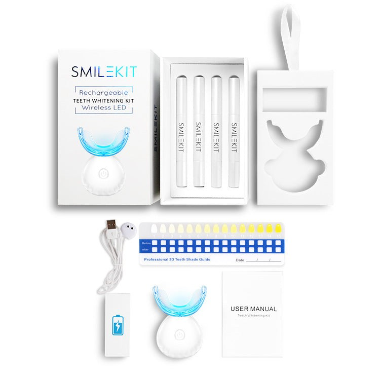 TheGromify wireless LED teeth whitening kit with U-shaped tray, four whitening pens, shade guide, and charging cable.